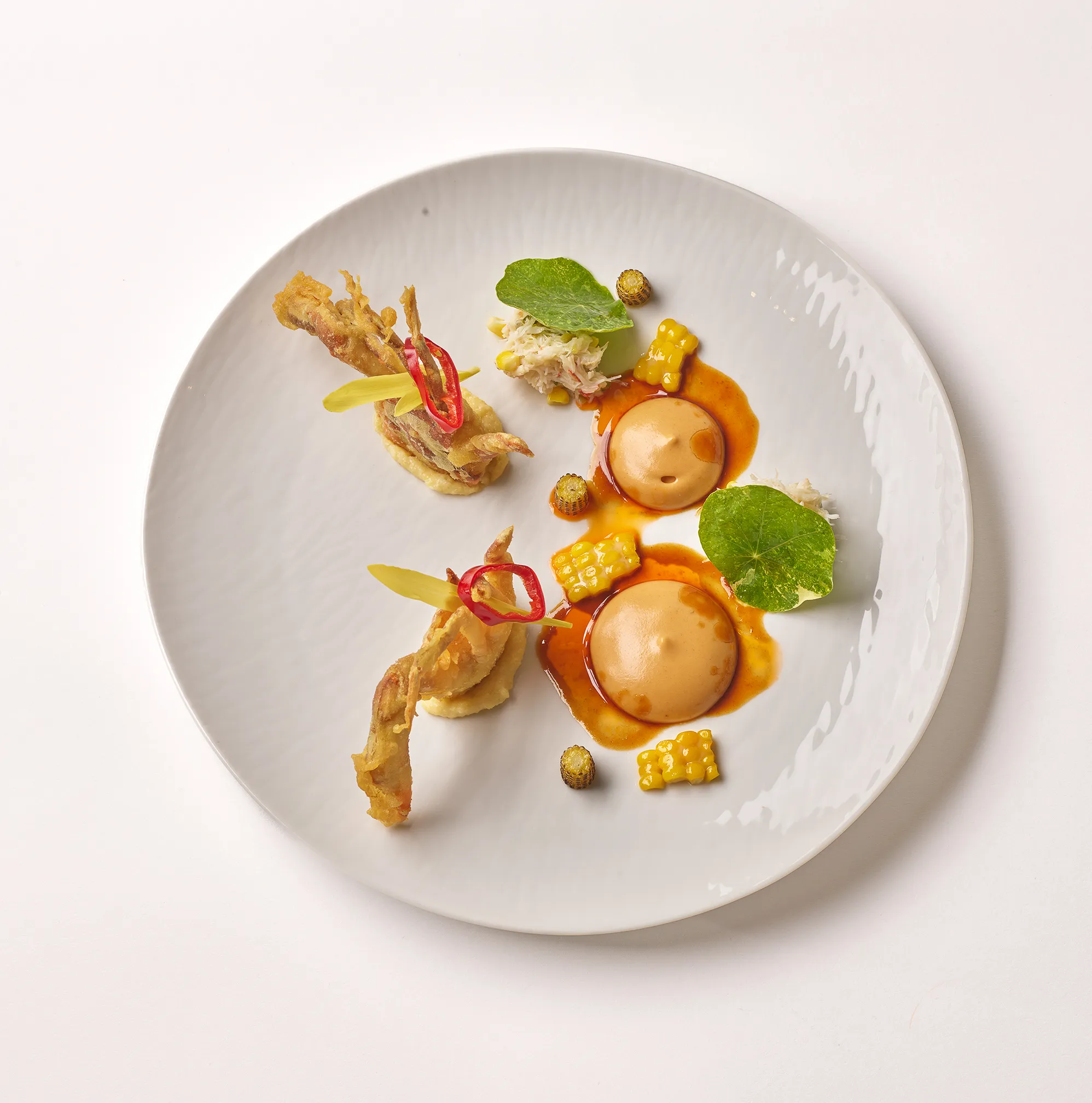 Daniel's Restaurant signature dishes Pelphrey Farm Rabbit “Porchetta”
“Chaud-Froid” Maine Lobster
East Coast Crab Duo